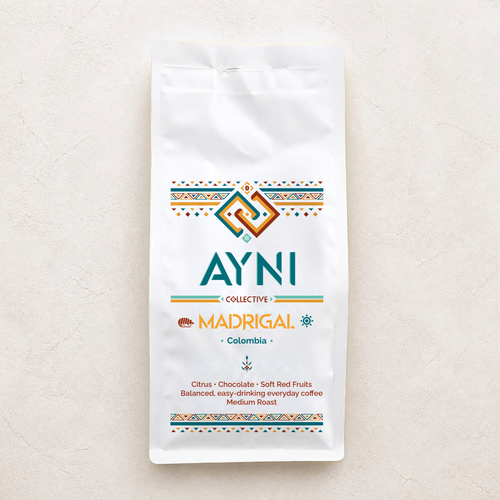 A white bag of Ayni Collective Madrigal Colombia coffee, featuring a colorful geometric logo and product details, set against a textured off-white background.